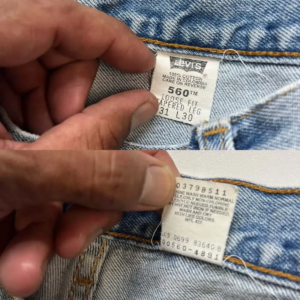Vintage 90s Levis 560 Loose Tapered Leg Light Wash Blue Denim Jeans 31x30 0432